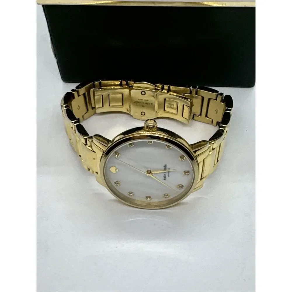 Kate Spade New York 0007 Women's Gold Stainless Steel Analog Dial Watch JNA109
